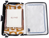 Open suitcase with BLYND Premium Portable Beach Head Shade easily fitted